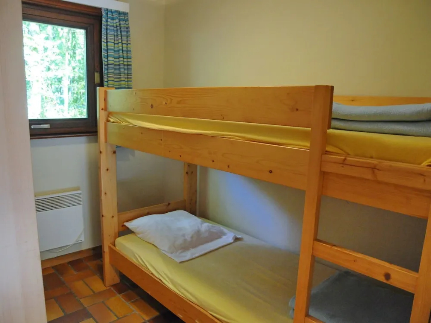 Wooden Chalet With Stove and Microwave Located in the Forest