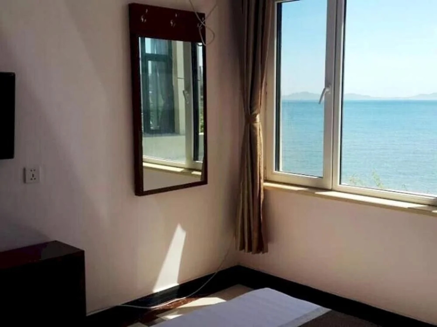 Xingcheng Xiaolonggong Hotel