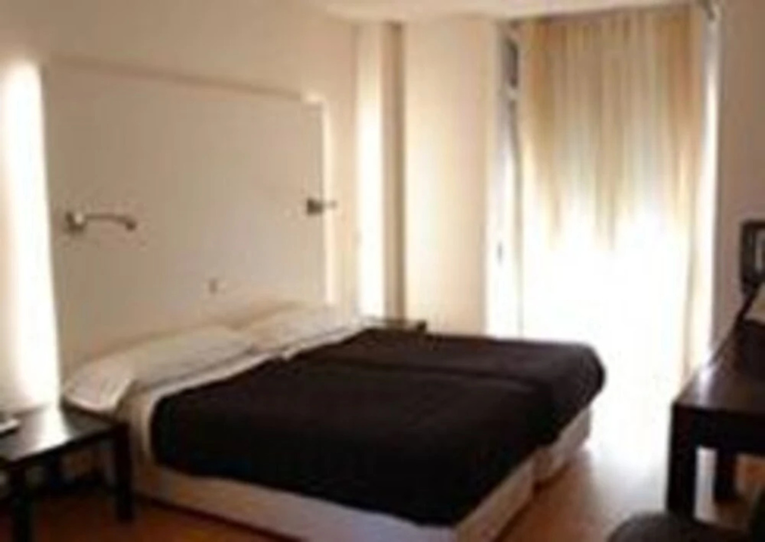 Hotel Asador H.M. Versus