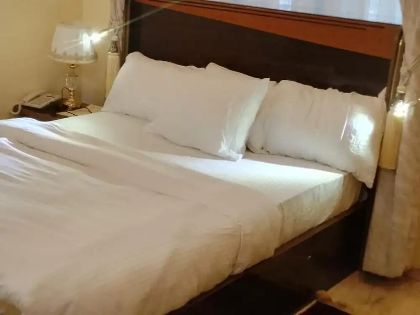 Naptin Executive Hotel And Suites