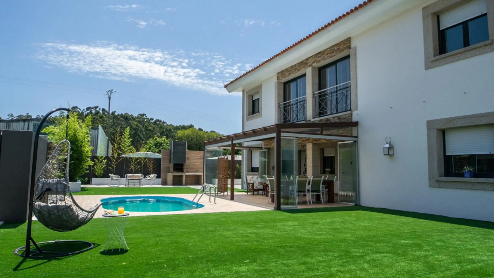 Villa con piscina a pie de playa