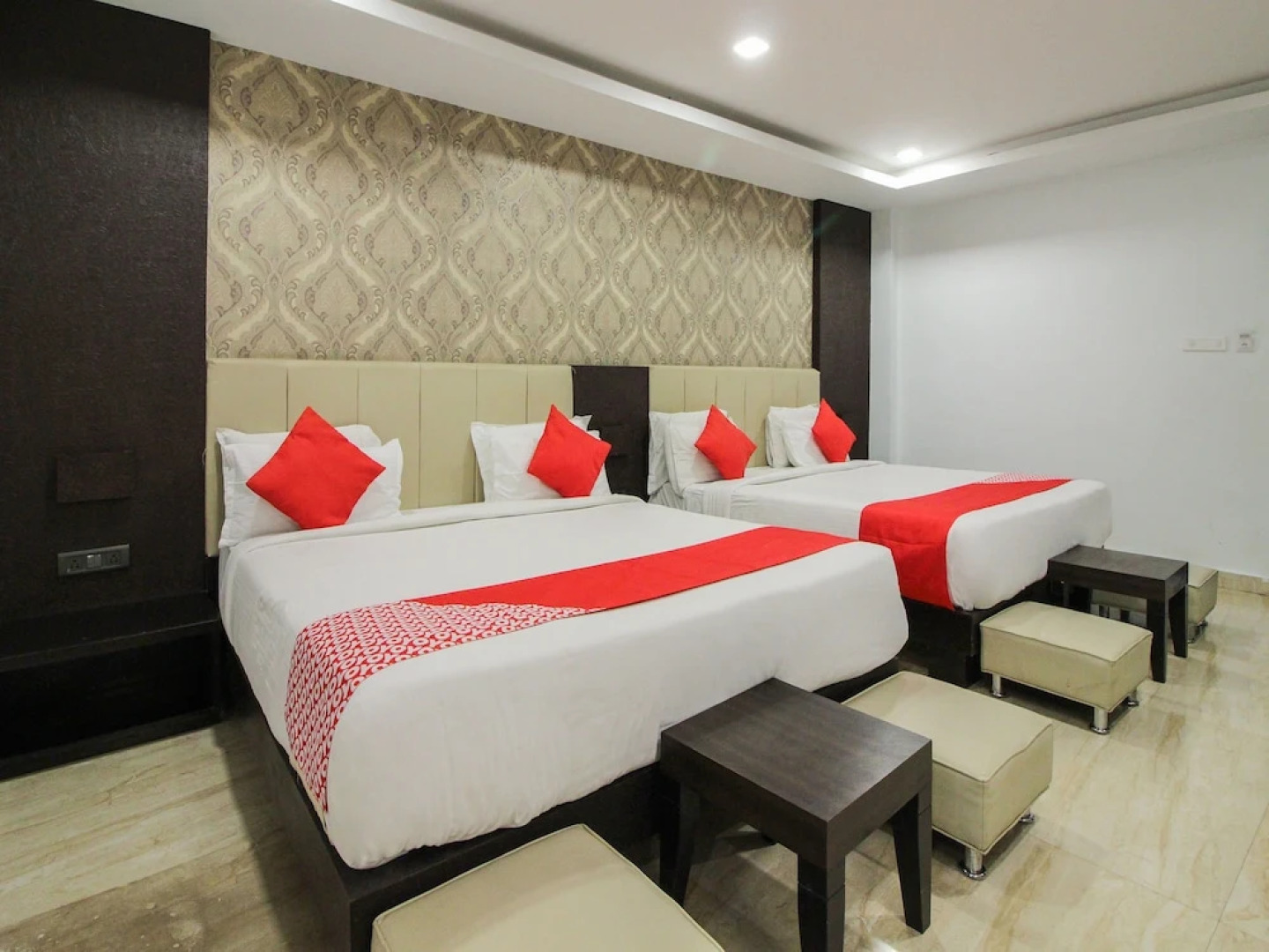 Capital O 15964 NI Ambaari Suites