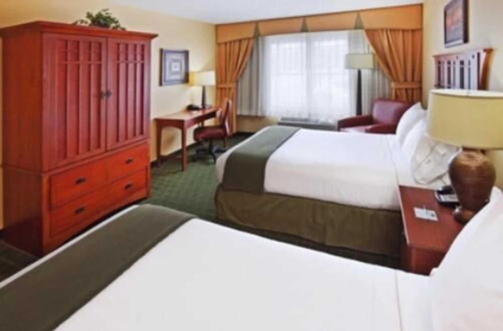 The Q Hotel And Suites