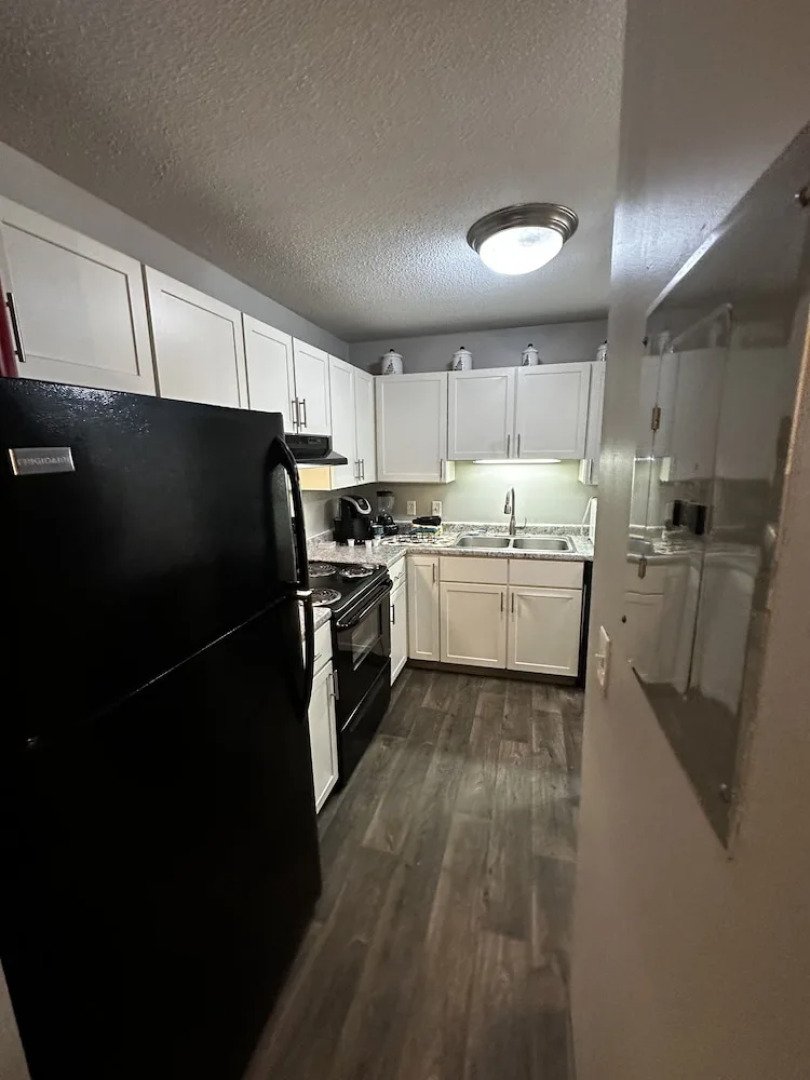 2 BR con patio por el centro comercial