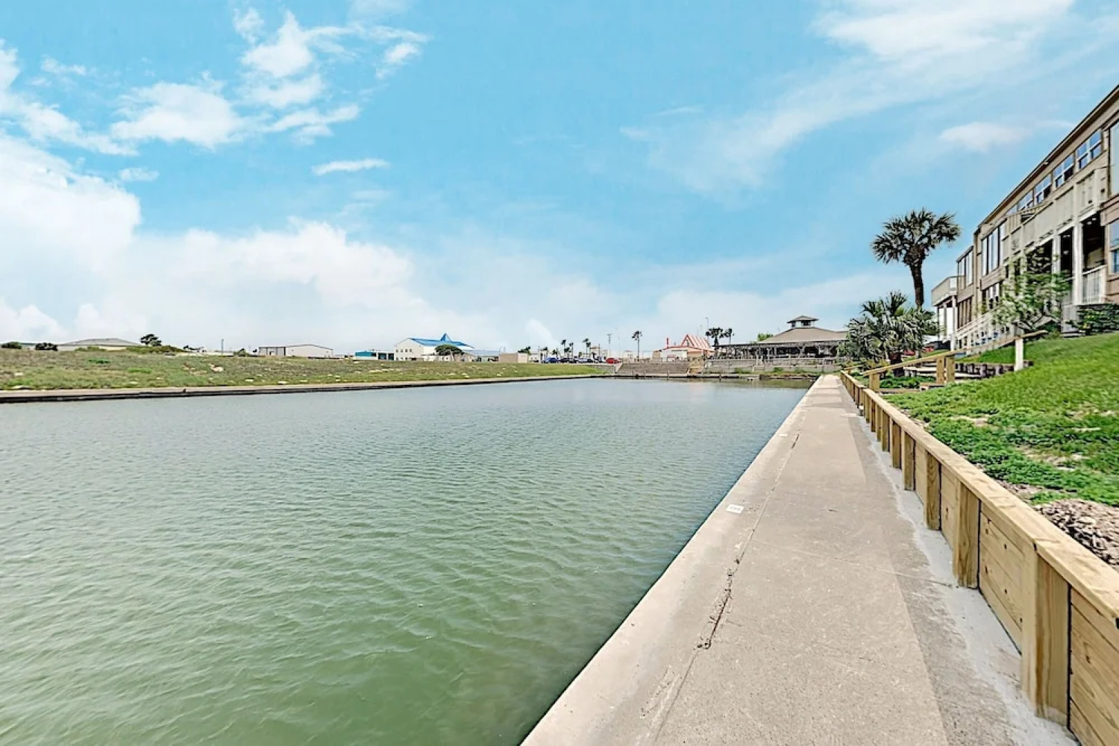 Lovely Canal-front W/ Pools & Boat Slip 2 Bedroom Condo