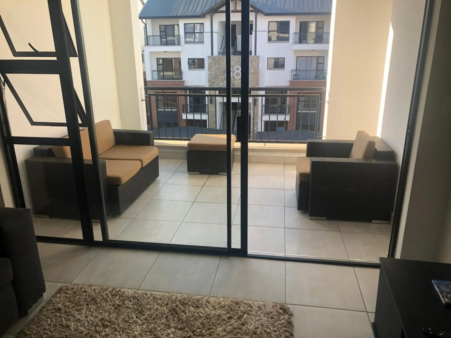 A Coastal/island experience at a Large 2 bed apartment at a Crystal Lagoon Estate.