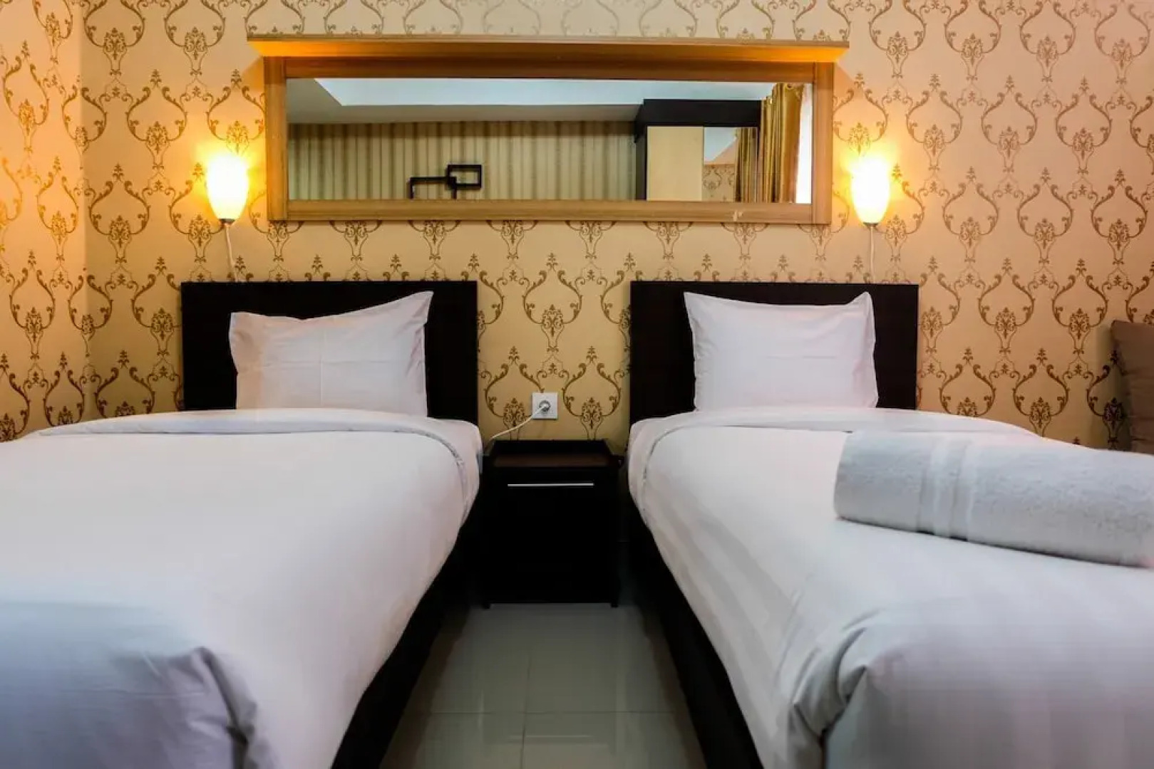 Minimalist and Comfy Studio The Oasis Cikarang Apartment By Travelio