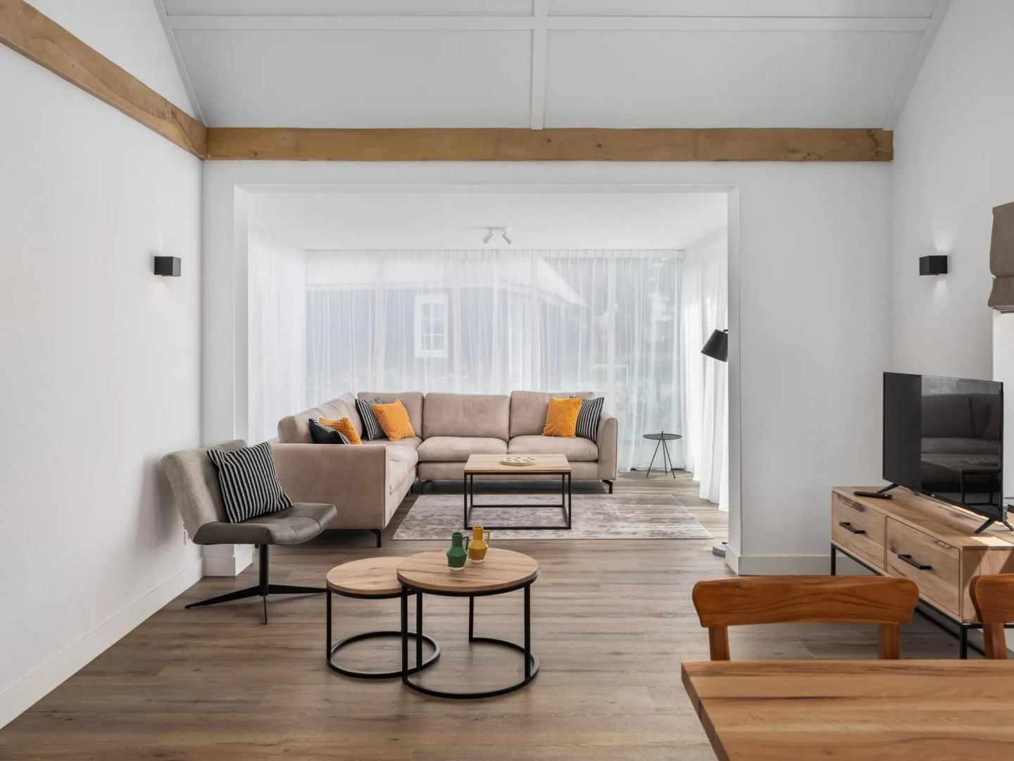 Thatched villa with sauna, in a holiday park surrounded by nature