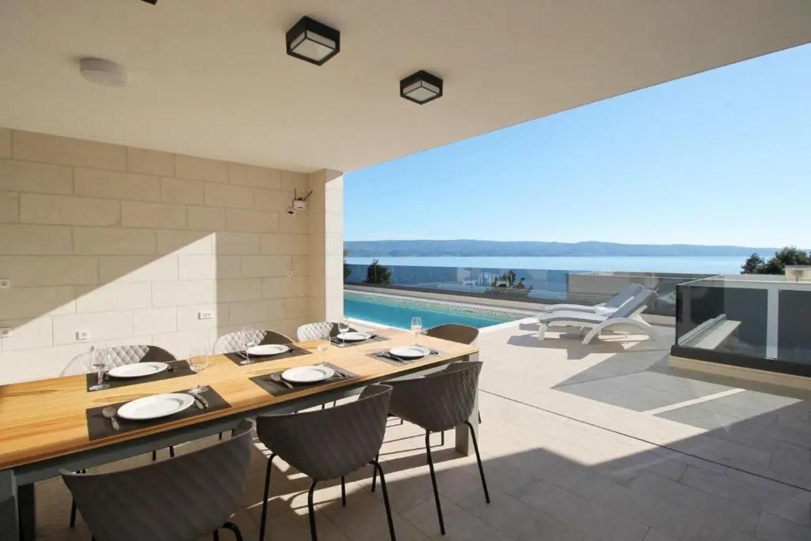 Luxury, seafront Villa IVAN with heated pool only 100m from beach