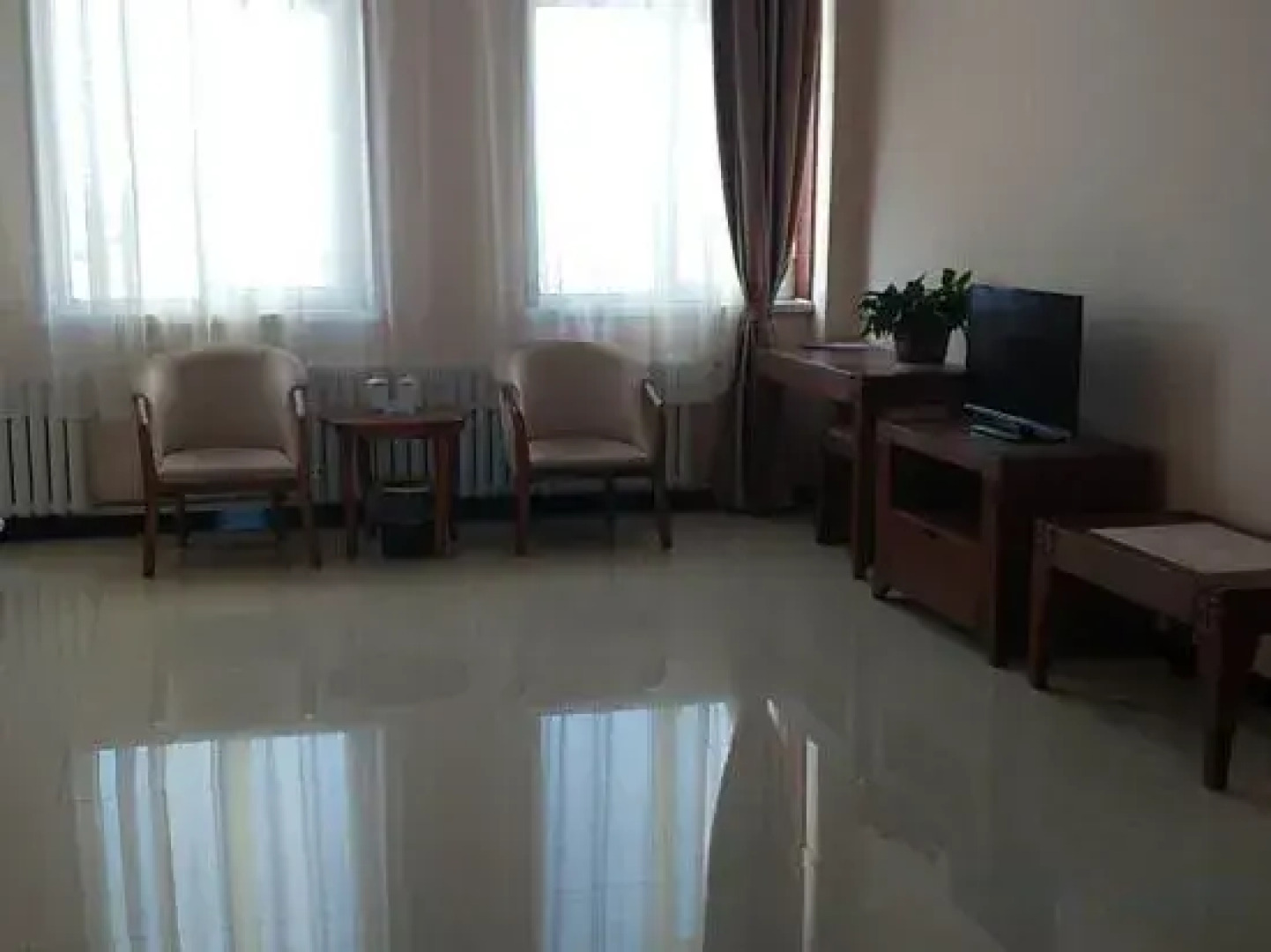 Zhenglan Qijiatai Business Hotel