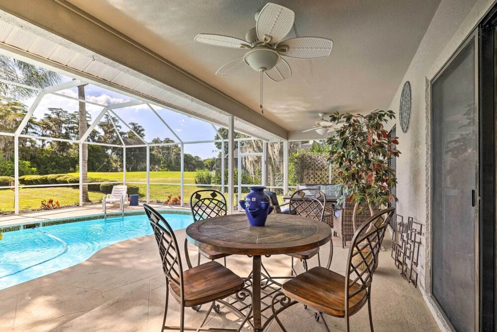 Palm Harbor Home w/ Pool & Golf Course Views!