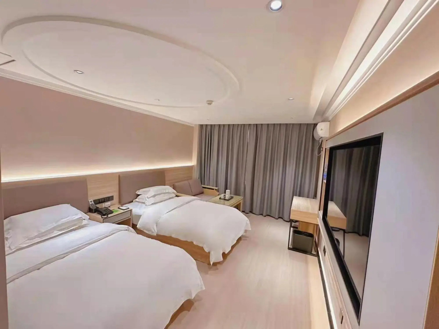 Wanjia Business Hotel (Zaozhuang Maoyuan)