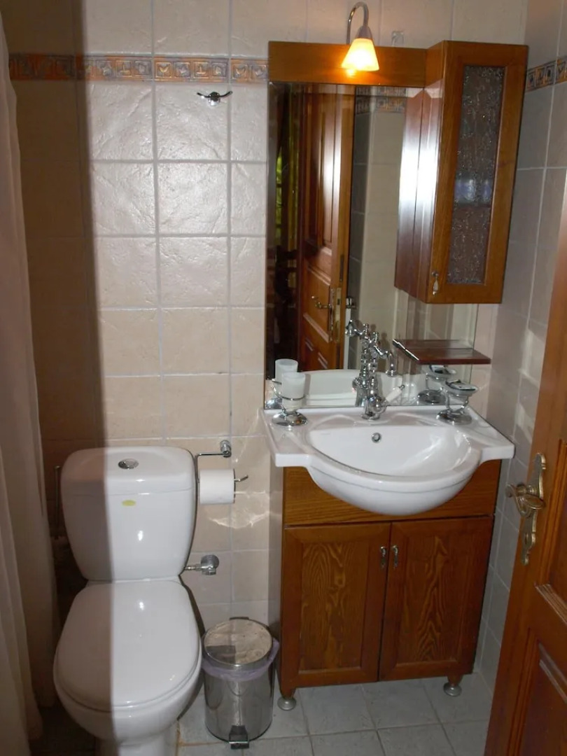 Heliodora Deluxe Triple Room 3