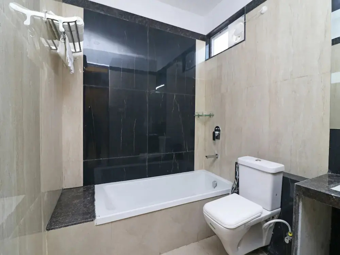 Capital O 19916 The Grand Tilak