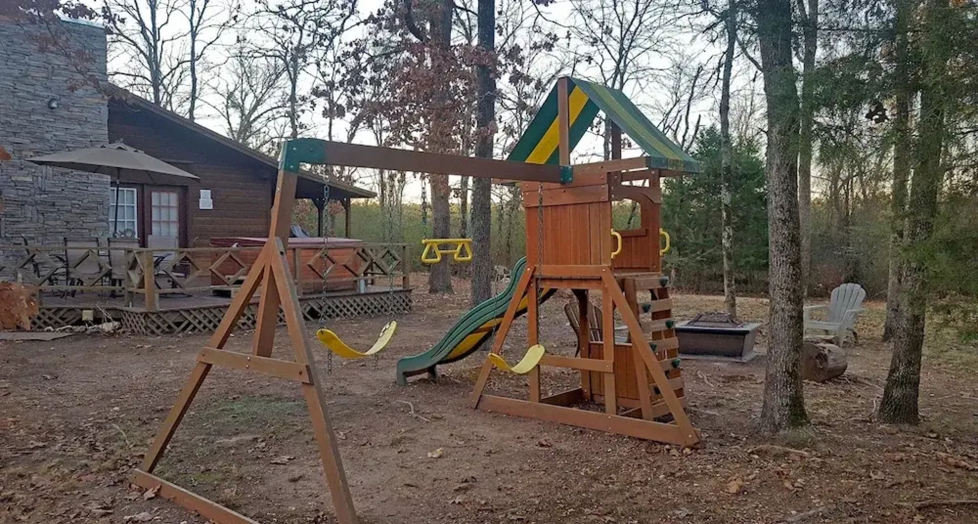 Cast Away Family Cabin with Hot Tub, Fireplace, and Kids Area by RedAwning