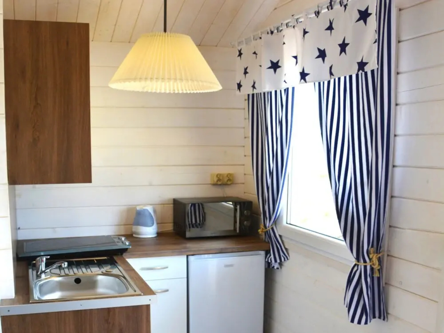 Detached holiday cottages located 200 m from the sea in a seaside village