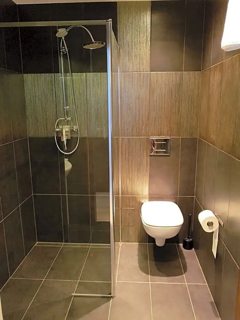 Pod Kominem Pokoje i Apartamenty