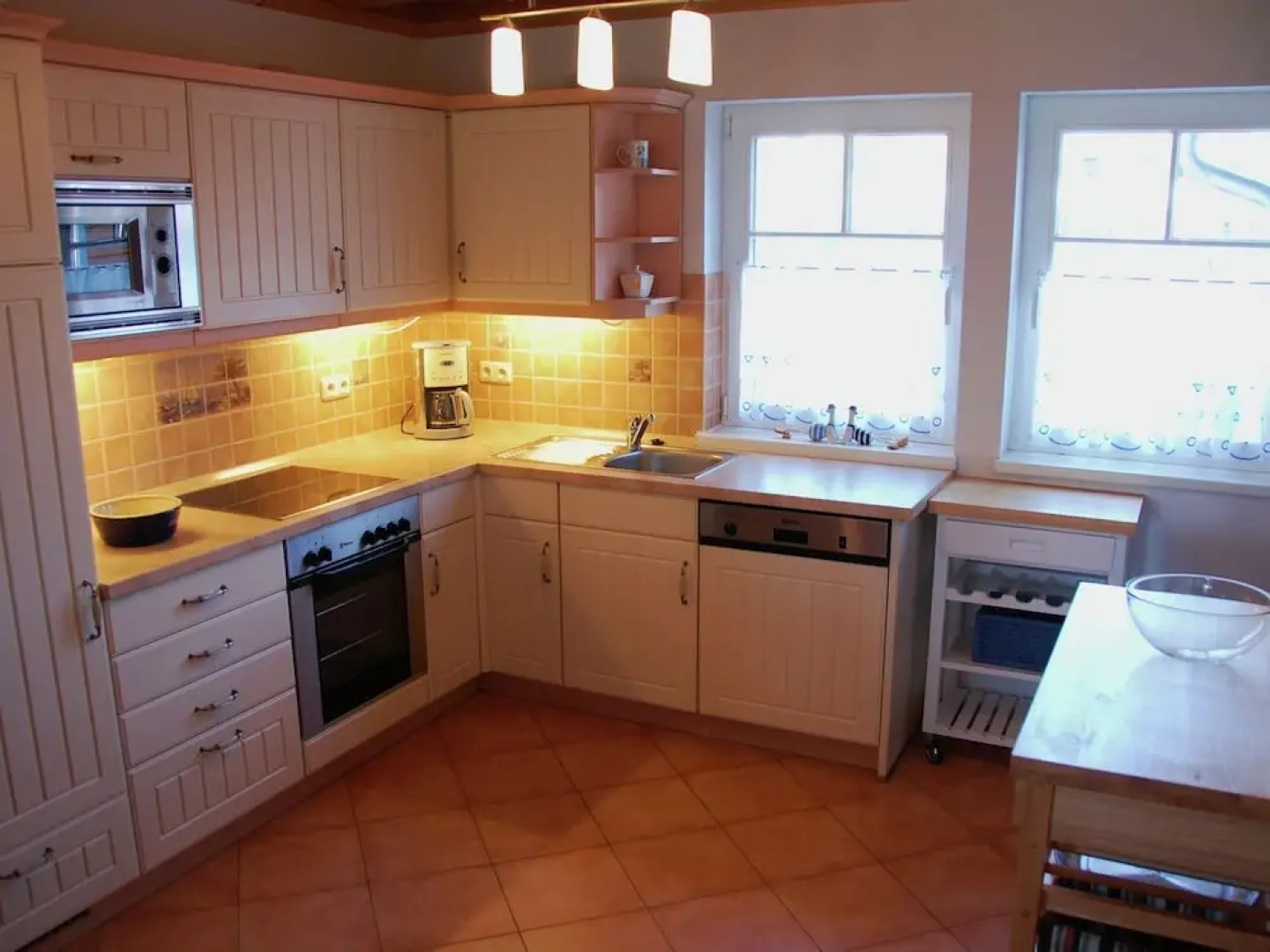 Cozy Holiday Home with Wood Burning Stove near Water