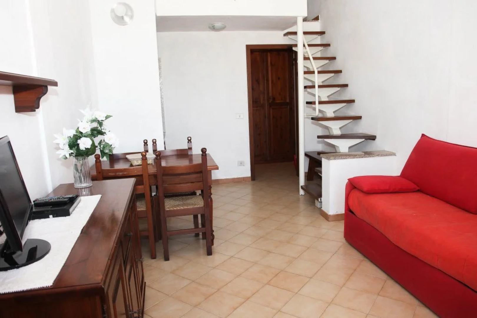 Cosy Holiday Home in Isola Rossa With Garden