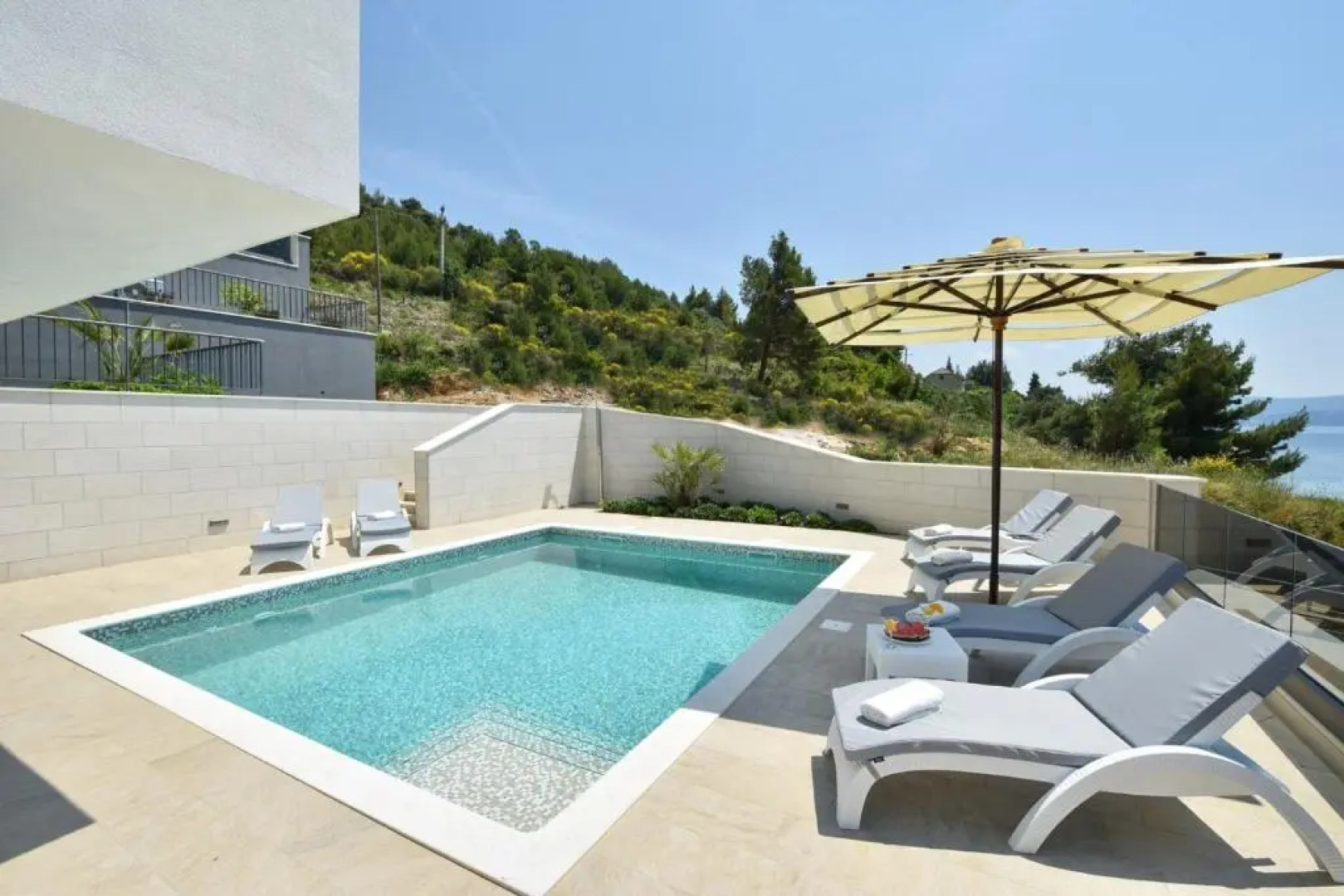 Luxury, seafront Villa Petra with heated pool only 50m from beach