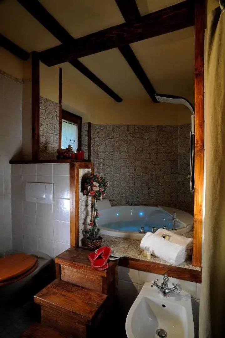 Aparthotel Foyer d'antan SUITE con caminetto hammam o vasca idromassaggio