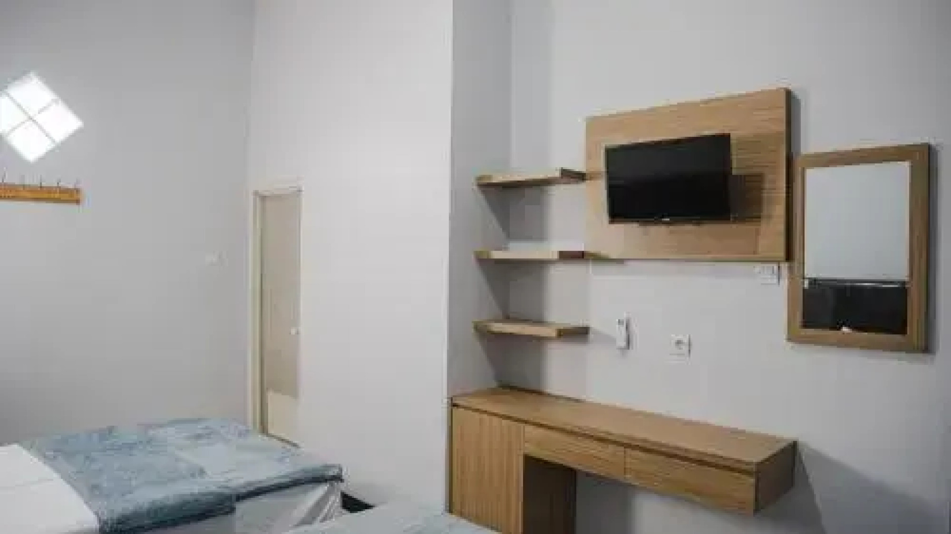 Sitiinggil Guesthouse by RedDoorz