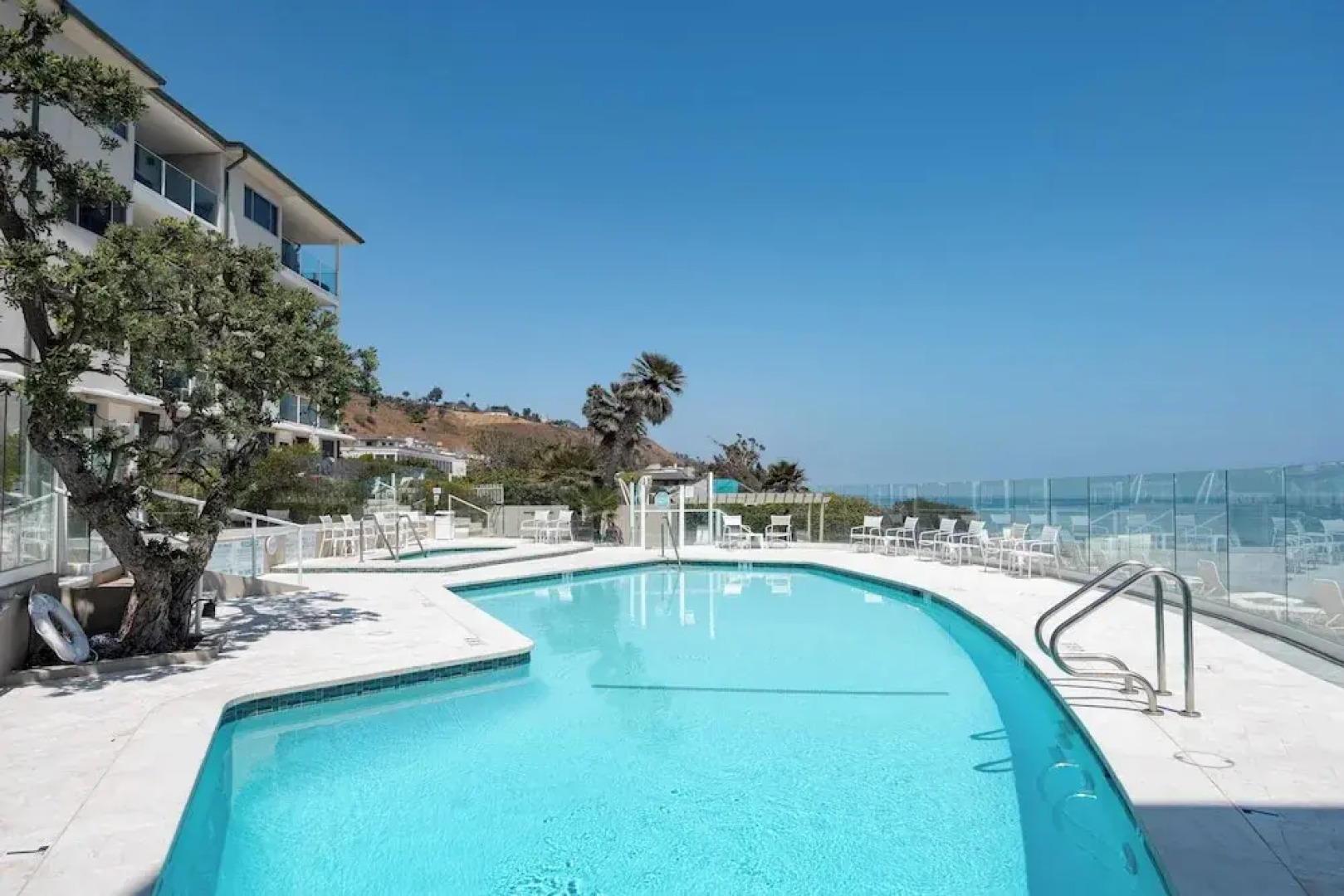 Oceanfront Gem w/ Balcony, Pool, Hot Tub & Carbon Beach Access Bluewater Haven by Avantstay