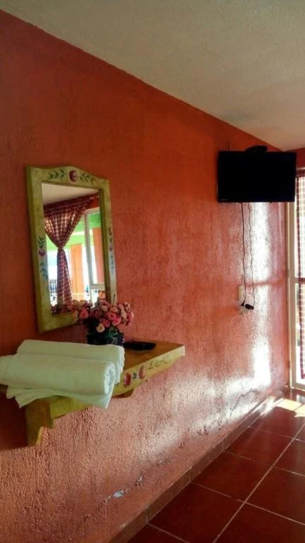 Cabañas y Habitaciones El Malecón