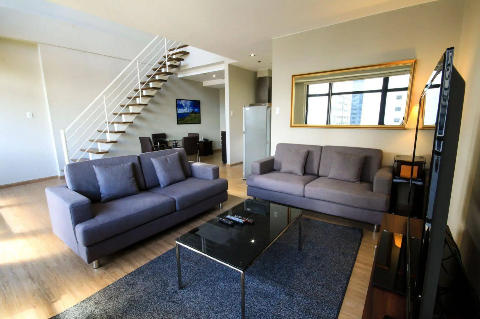 SIGLO SUITES @ The Gramercy Residences