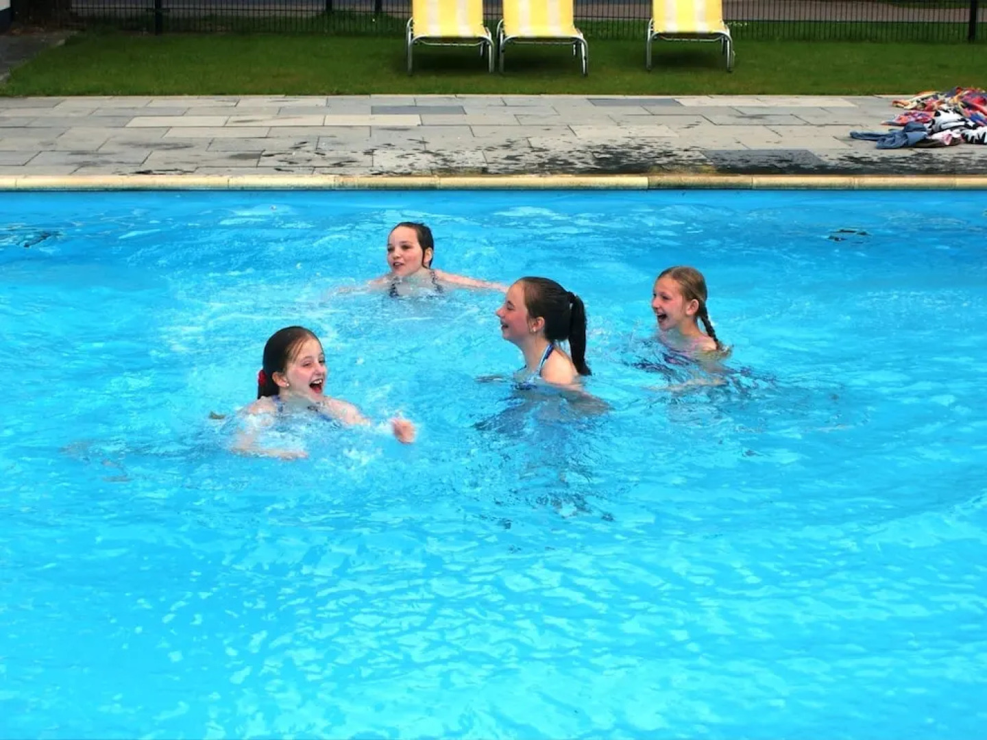 Cozy decorated house with fireplace, surrounded by forest