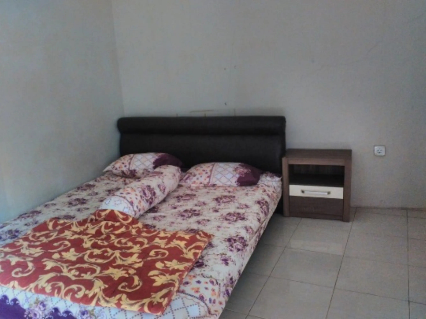 Nabila Syar i Guesthouse by ZUZU