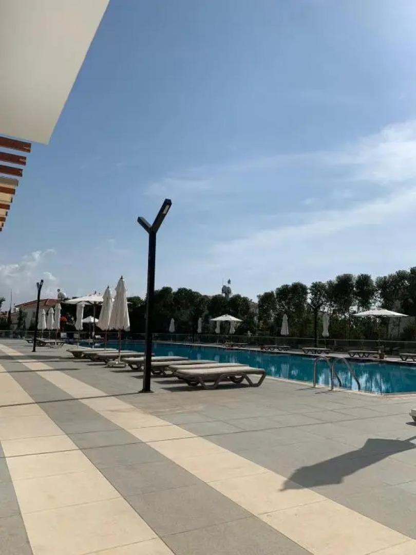 Stunning 2 plus 1 apartment for rent in ABELIA RESIDENCE at Bogaz with beautiful sea and mountains views