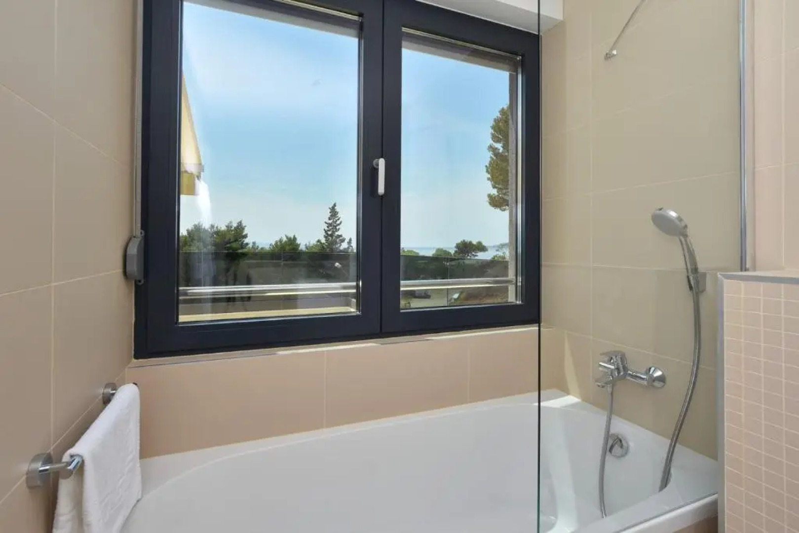 Luxury, seafront Villa Petra with heated pool only 50m from beach