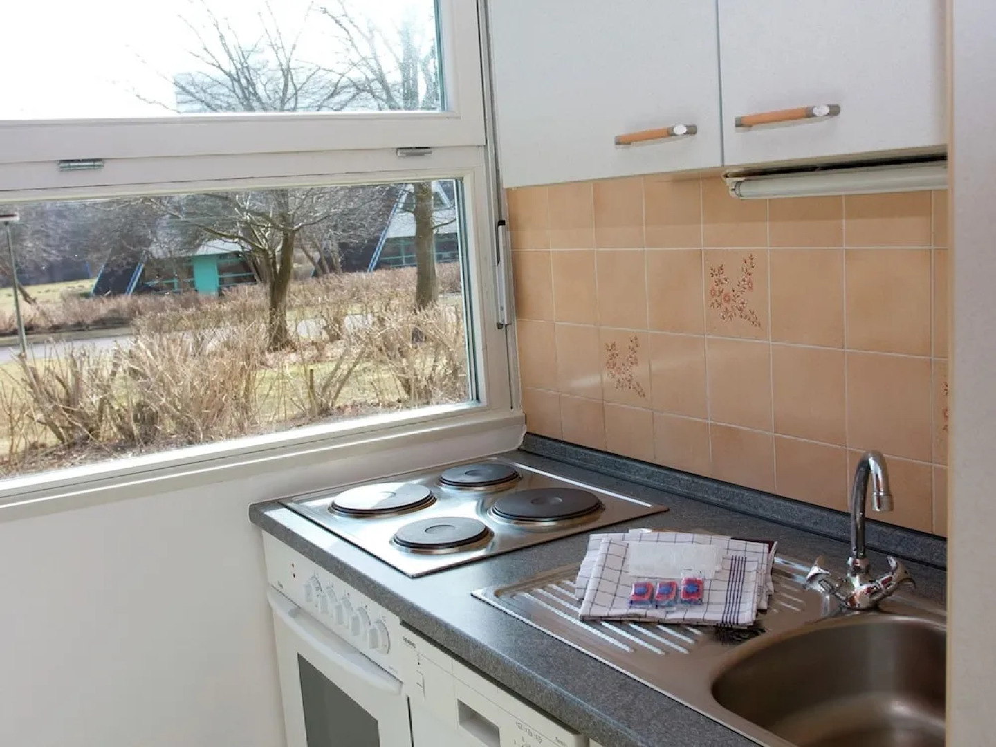 Detached holiday home, decorated with wood, on the Ostsee