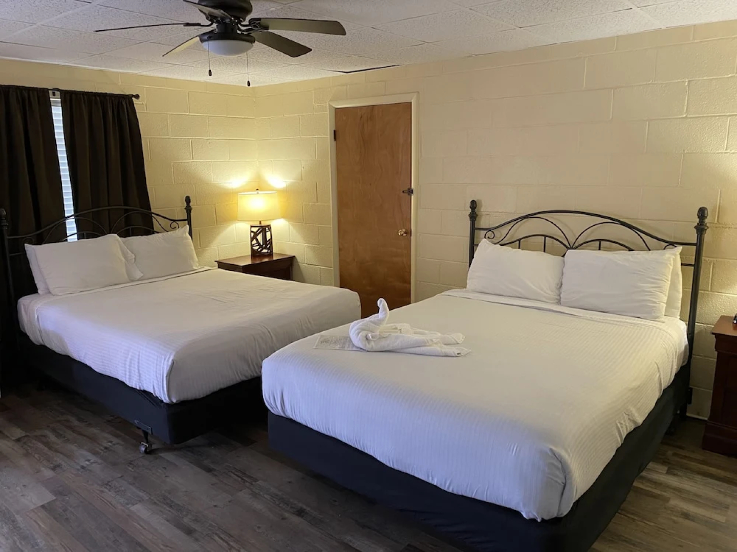 Queen Guest Room located at the Joplin Inn at the entrance to Mountain Harbor, just 2 1/2 miles from Lake Ouachita. by RedAwning