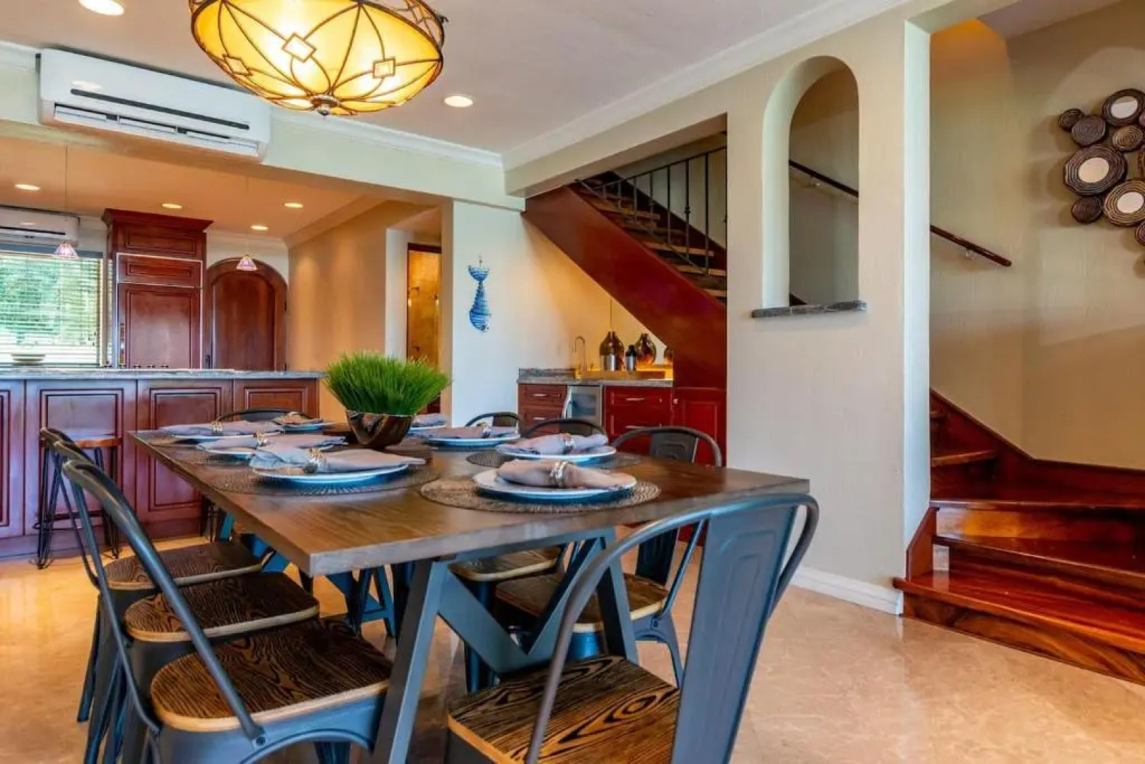 Stylish Split-Level Condo with a Shaded Terrace, Direct Beach Access, and Resort-Style Community Amenities