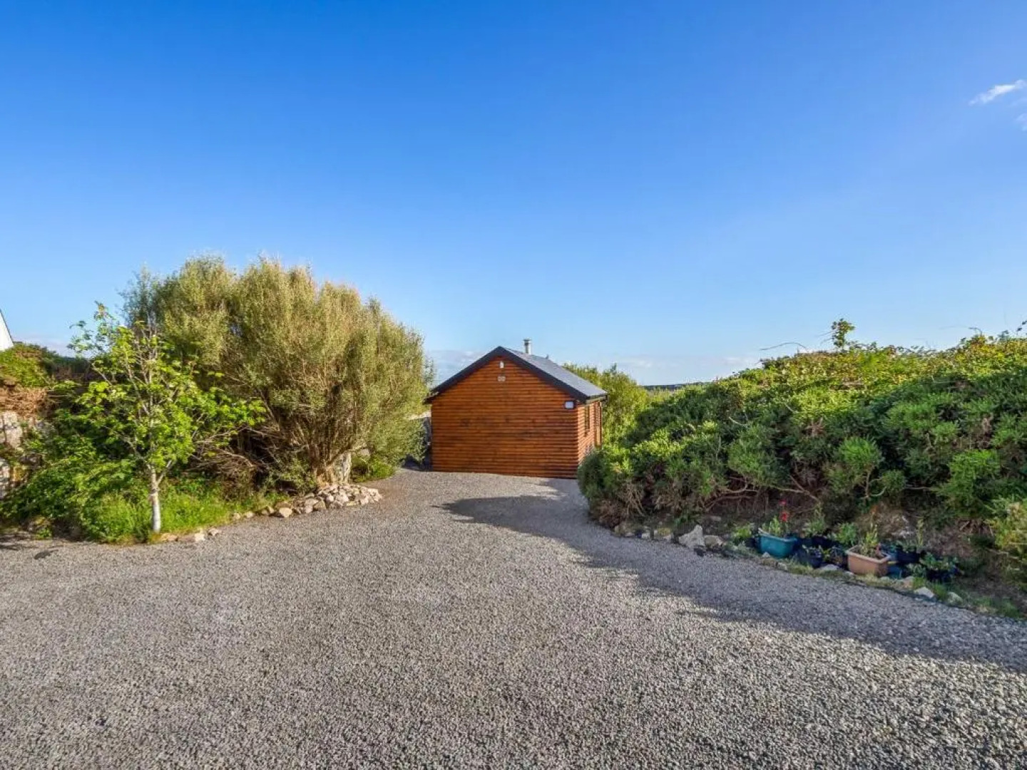 Seaside Log Cabin, Carna