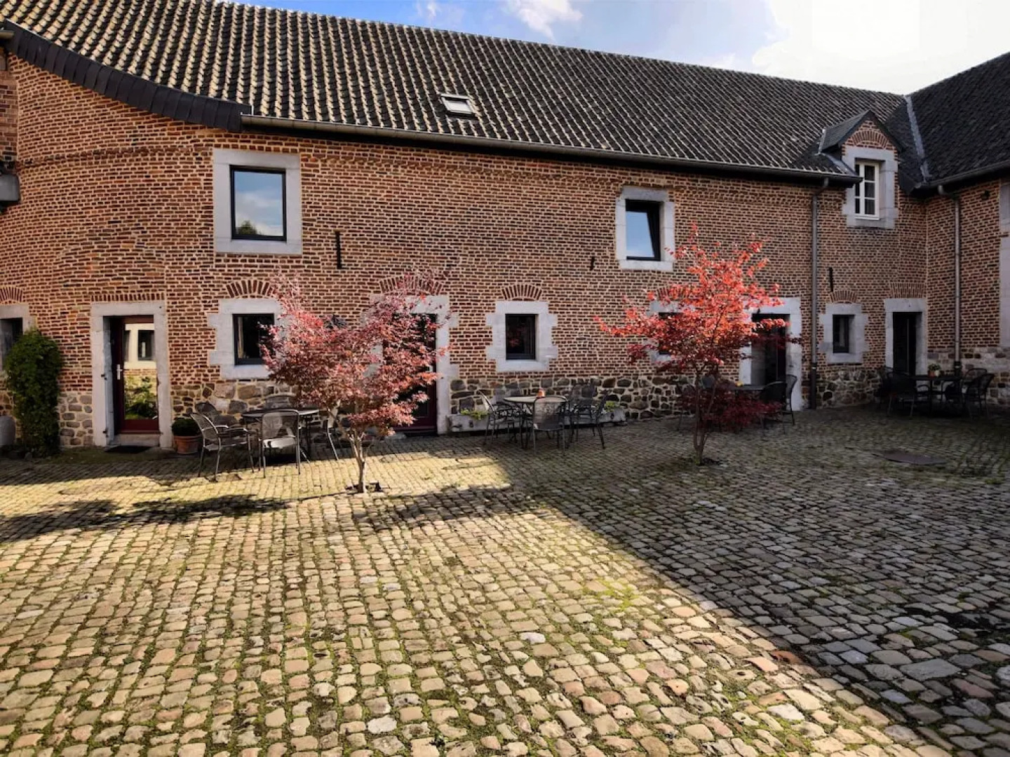 Nice Apartments in a Monumental Square Farm