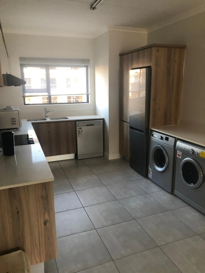 A Coastal/island experience at a Large 2 bed apartment at a Crystal Lagoon Estate.