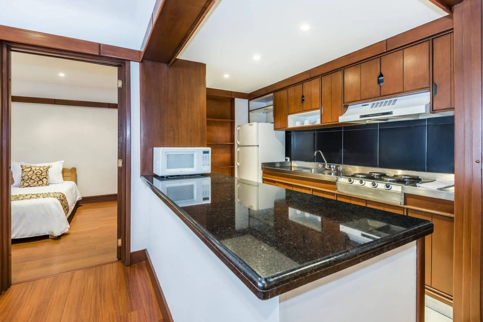 Travelers Suites Condominio Plenitud