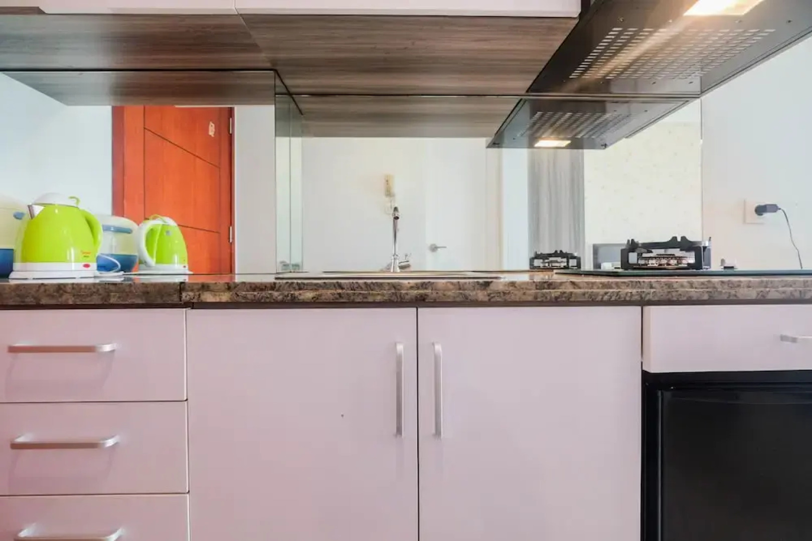 Minimalist Tamansari Mahogany Studio Apartment with City View