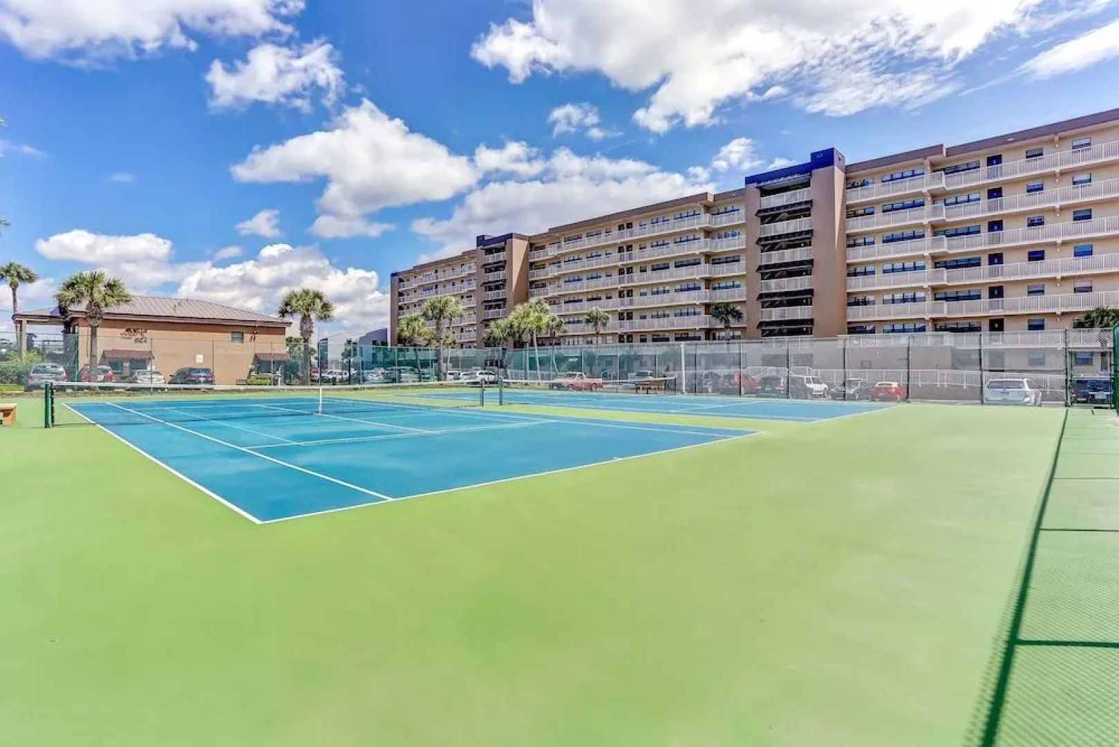 North End Corner Unit with View of the Ocean and Miles of Sandy Beach by RedAwning
