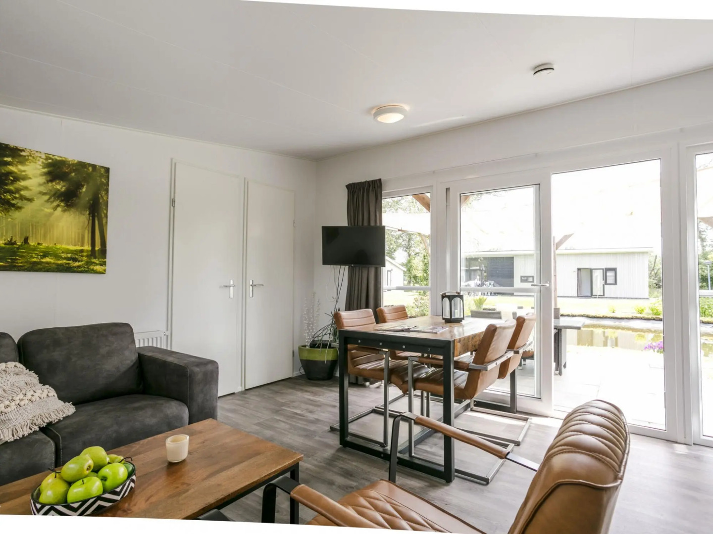 Sunlit Chalet by the Pond