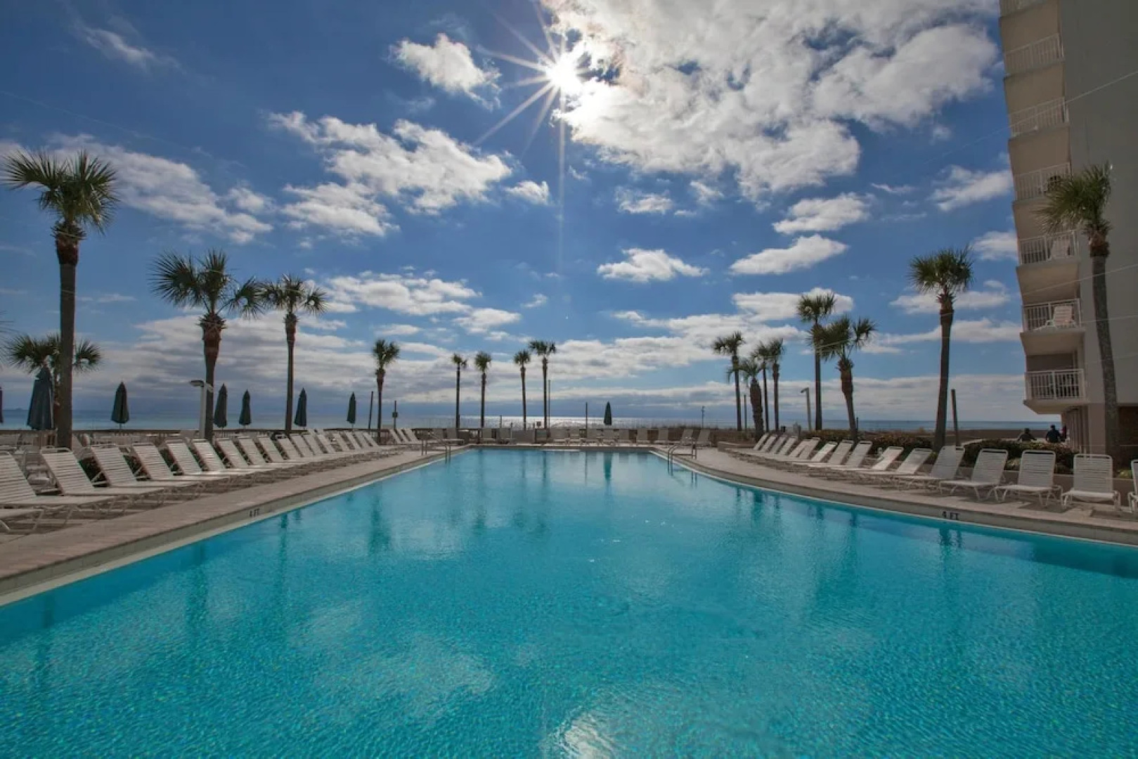 Dunes of Panama Beach Resort by Panhandle Getaways