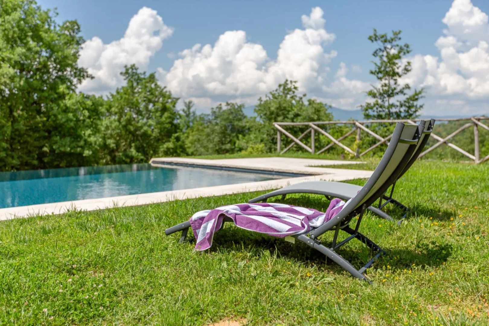 In an enchanting position, located on a hill, Podere Calcina is a recently completely renovated farm-Podere Calcina