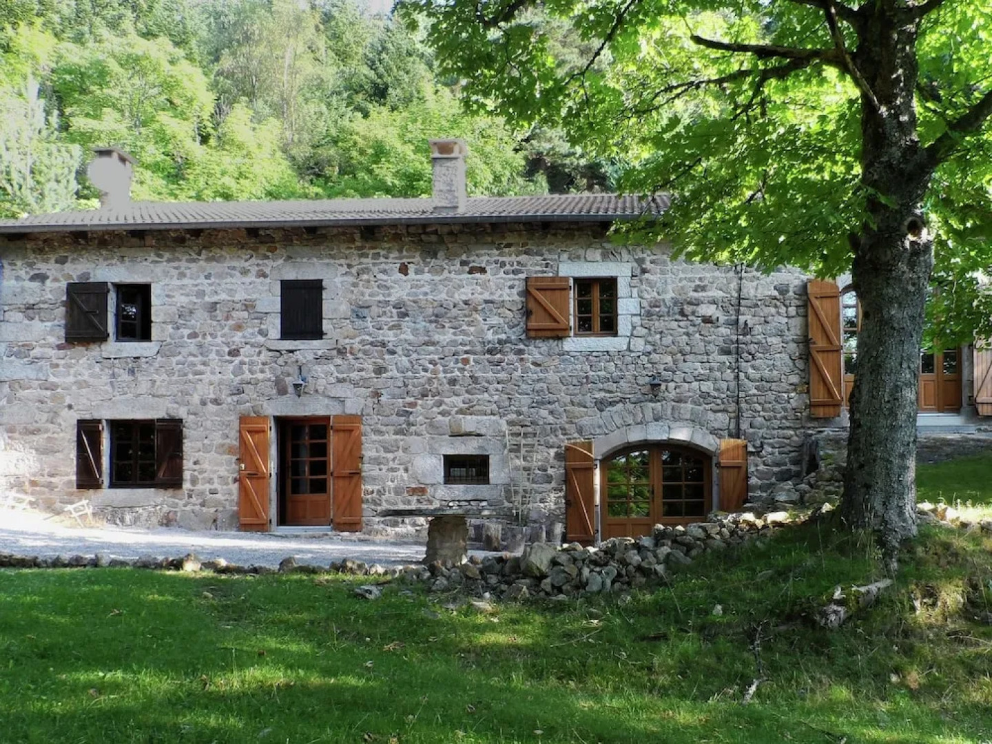 Beautiful Stone Farmhouse in Mountain Forest Setting