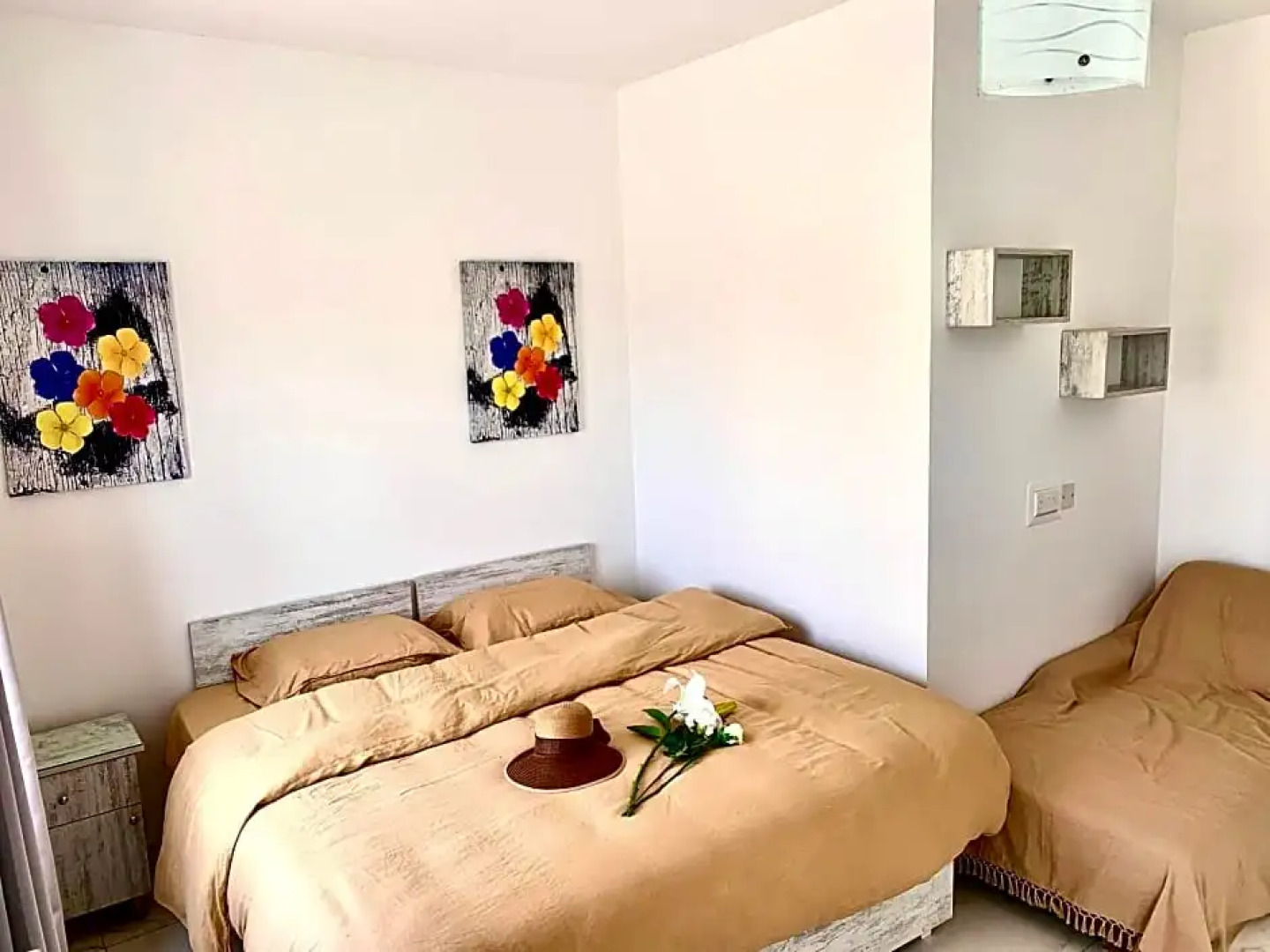 Private bedroom with balcony in a shared apartment at the Bay of Xlendi