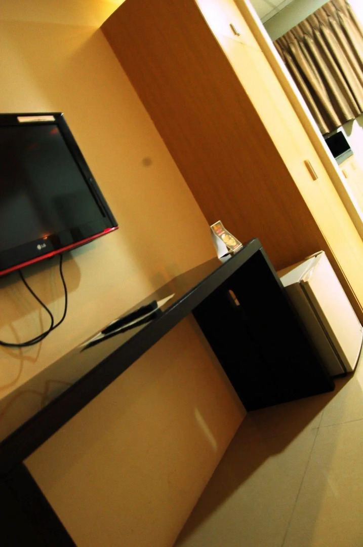 Rumi Apartelle Hotel