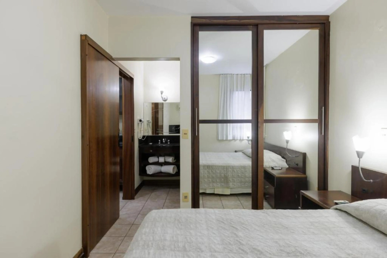 Le Village Flats e Hotel