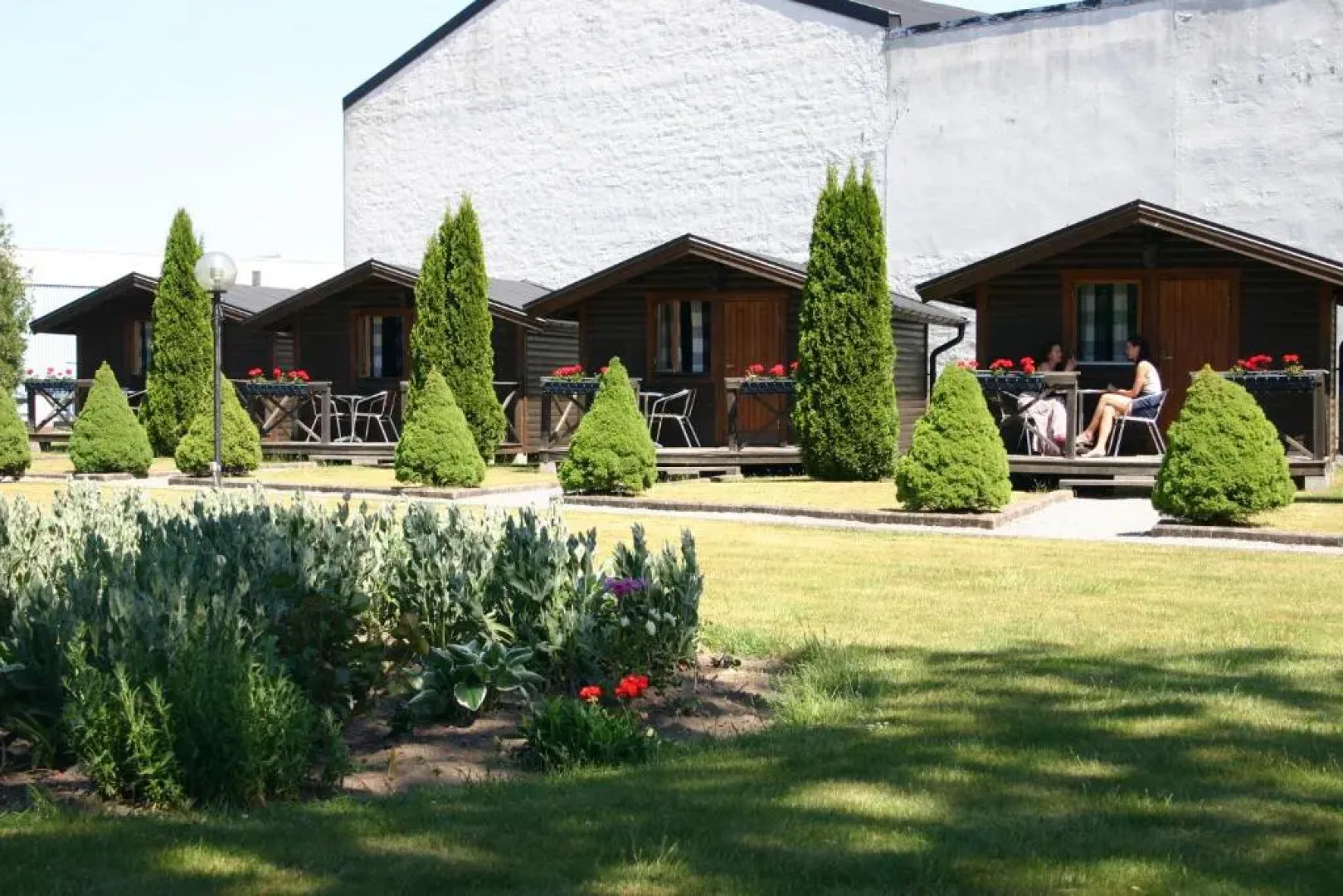 Milano Garden - City Bungalow Hotell, i gränssnittet till Kullabygdens pärlor